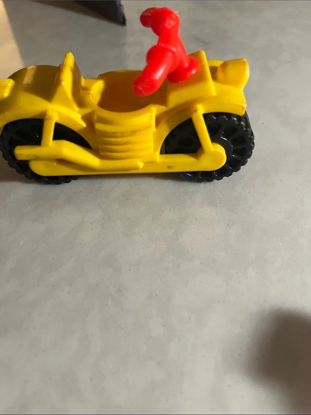 Vintage Fisher Price motorcycle with policeman